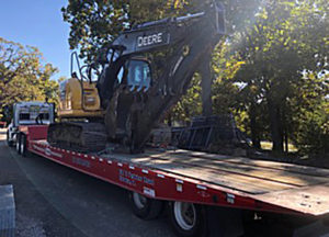 equipment moving flatbed truck service